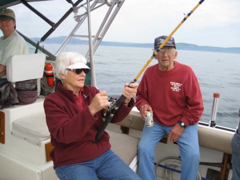 Marge with fish, Bob Looking